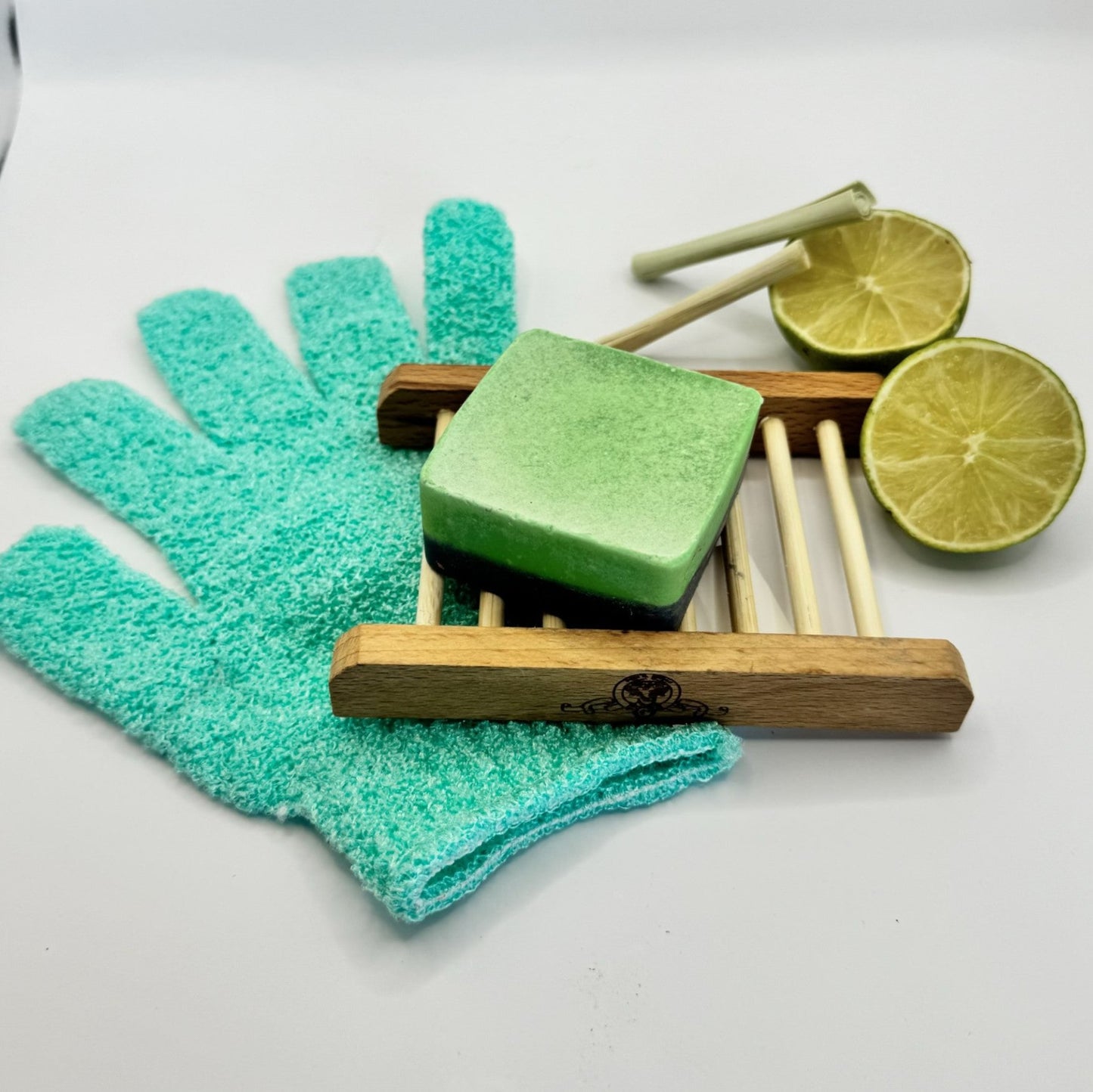 Green lemongrass and bergamot dog shampoo bar with green exfoliating glove